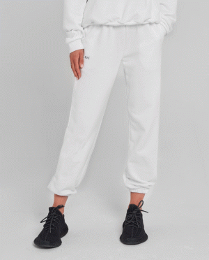 SELF LOVE - Białe spodnie dresowe New York.